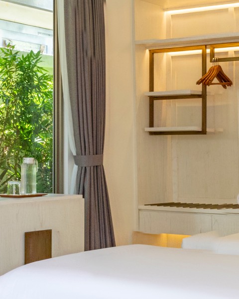 Villa Ria suite with warm wooden details